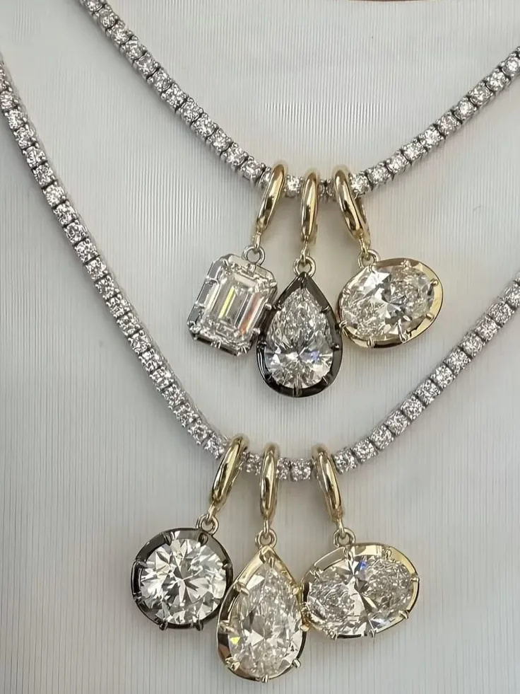 Line necklaces, layered with bezel drops